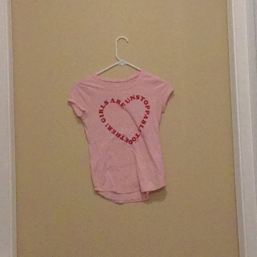 A cute girls justice shirt with a hearted quote